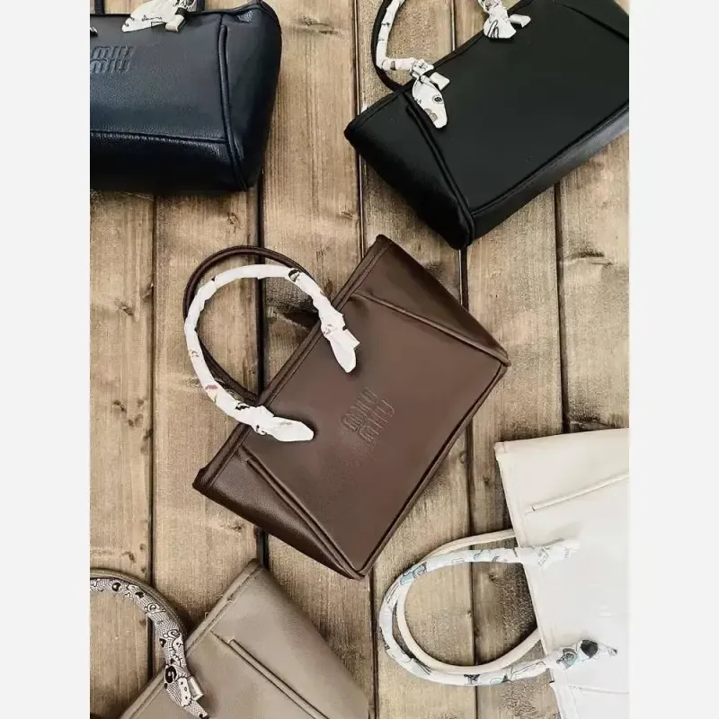 کیف زنانه مدل رستا میو میو شیک و جادار با بند دستی و دوشی